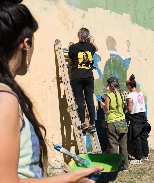 Mural en una de la jornada de la gira